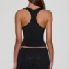 Aine Embellished Jersey Scoop-Neck Racerback Top i svart