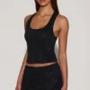 Aine Embellished Jersey Scoop-Neck Racerback Top i svart