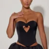Amora Embellished Heart Cut-Out Strapless Corset Top i svart