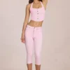 Anessa midjehög caprijeans i blommig rosa