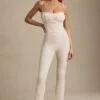 Arlena Jumpsuit med spets och rosettdetaljer i färg Ivory