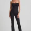 Arlena Jumpsuit med spets och rosettdetaljer i svart