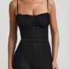 Arlena Jumpsuit med spets och rosettdetaljer i svart