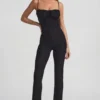 Arlena Jumpsuit med spets och rosettdetaljer i svart