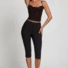 Armelia Embellished Peekaboo Cowl-Neck Top i svart