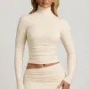 Auri Modal Ruched Backless Turtleneck Top i Ivory