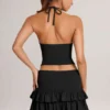 Azaria Modal Ruffle Mid-Rise Mini Skort i svart