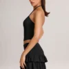Azaria Modal Ruffle Mid-Rise Mini Skort i svart