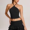 Azaria Modal Ruffle Mid-Rise Mini Skort i svart