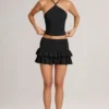 Azaria Modal Ruffle Mid-Rise Mini Skort i svart