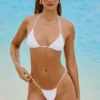 Bali-bikinibyxor med snörning och dekorationer i vitt