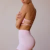Bandeau-bh med korsade ryggband i mjukt rosa