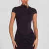 Blair Jersey Turtleneck Ruched Backless Miniklänning i svart