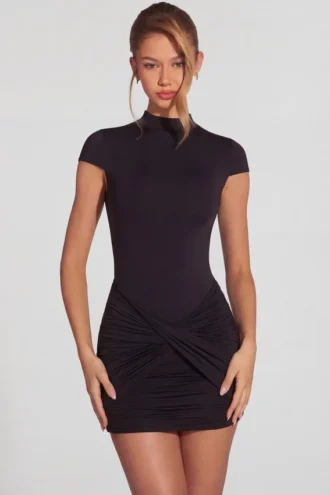 Blair Jersey Turtleneck Ruched Backless Miniklänning i svart