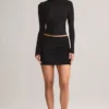 Cali Modal Ruched Mid-Rise Mini Kjol i svart