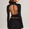 Cali Modal Ruched Mid-Rise Mini Kjol i svart