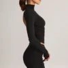 Cali Modal Ruched Mid-Rise Mini Kjol i svart