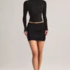 Cali Modal Ruched Mid-Rise Mini Kjol i svart