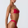 Clearwater Bikini-toppar med rynkad halterneck och dekorationer i hallonrosa
