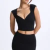 Cora Modal Ruched Cap-Sleeve Top i svart