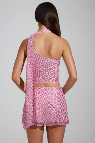Cosette-top med asymmetrisk scarf-detalj i rosa