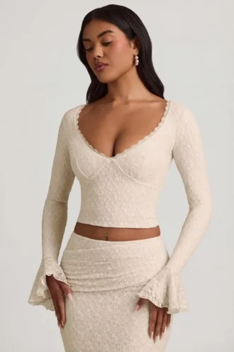 Dagny Ruffle långärmad spets-top i ivory