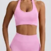 Define Luxe sport-BH med halterneck i bubblegumrosa