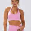 Define Luxe sport-BH med halterneck i bubblegumrosa