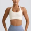 Define Luxe sport-BH med halterneck i vitt