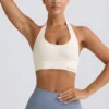 Define Luxe sport-BH med halterneck i vitt