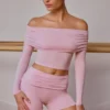 Genomskinlig off-shoulder-top med långa ärmar i mjukrosa