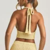 Gianna bouclé-crop-top med halterneck i gult