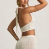 Gianna Bouclé halterneck crop top i vitt