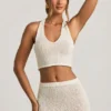 Gianna Bouclé halterneck crop top i vitt