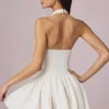 Haddie Modal Broderie Anglaise halterneck-miniklänning i vitt