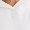 Hoodie i strukturerad bomullsjersey med grafiskt tryck i vitt