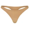 Intimates sömlös stickad string i karamell