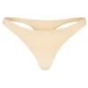 Intimates sömlös stickad string i varm persika