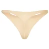 Intimates sömlös stickad string i varm persika