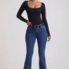 Jacey högmidjade flared-jeans i indigotvätt