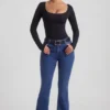 Jacey högmidjade flared-jeans i indigotvätt