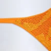 Jalama Tanga-bikinibyxor med dekorationer i orange tropiskt mönster