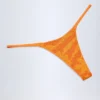 Jalama Tanga-bikinibyxor med dekorationer i orange tropiskt mönster