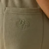 Joggingbyxor i bomullsfleece med medelhög midja i khakigrönt