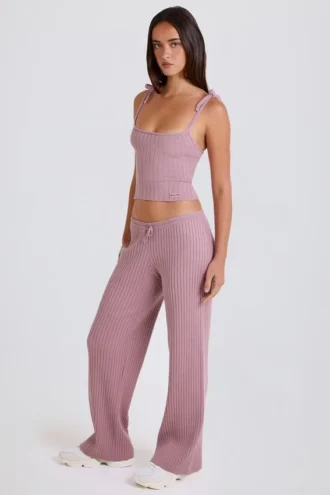 Joggingbyxor i ribbad stickning med vida ben i mauve