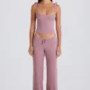 Joggingbyxor i ribbad stickning med vida ben i mauve