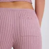 Joggingbyxor i ribbad stickning med vida ben i mauve