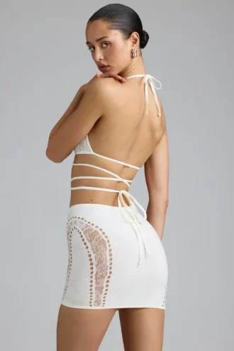 joni minikjol med dekor och medelhg midja i elfenben 4 330x495 - Liberty-bikinitopp med korsade band och dekorationer i ivory
