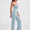Jumpsuit i grovstickad bandeau med utsvängda ben i dammig blågrön