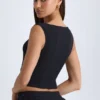 Kadie V-ringad strukturerad crop top i svart